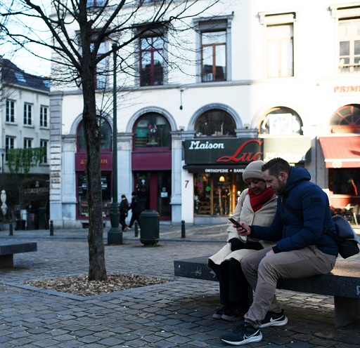 couple on bench in square