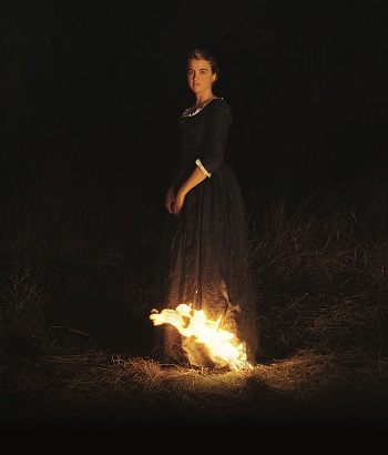 woman in front of fire