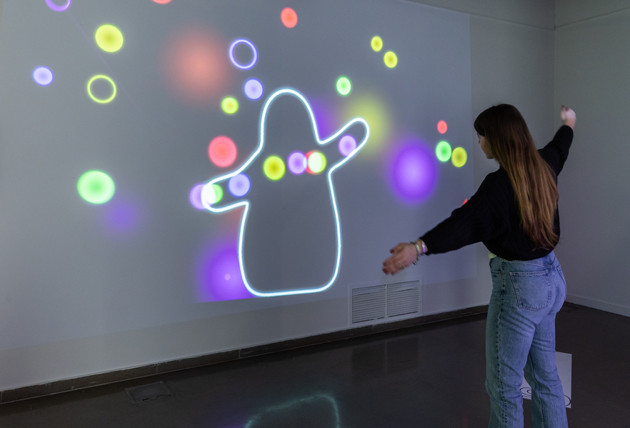 Person with interactive bubble display