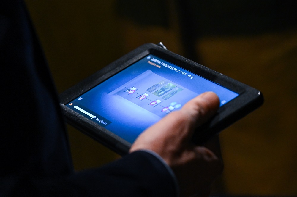 Tablet device being held by user