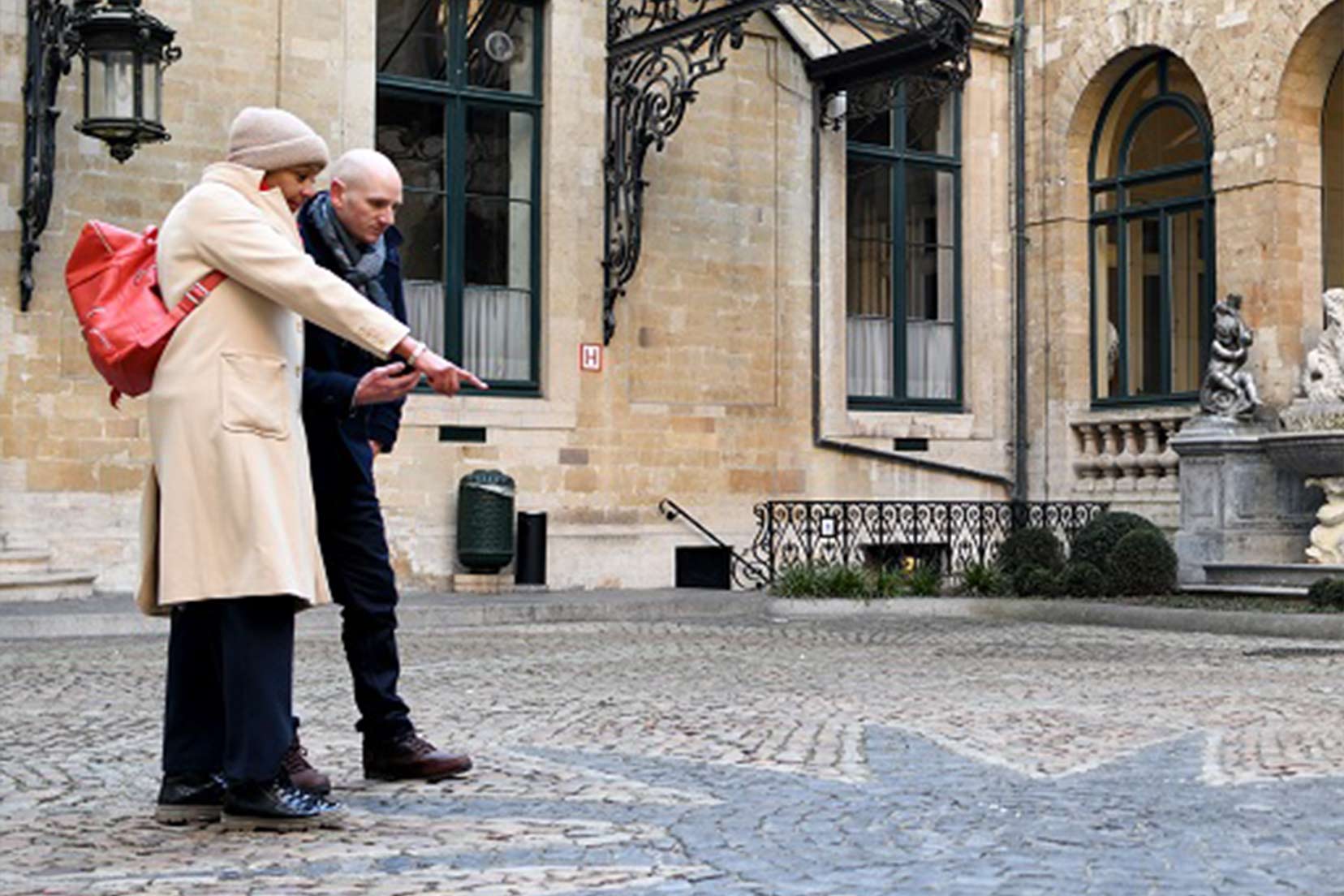 two people on an iwalk tour of the HEH