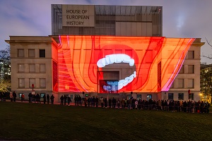 Projection of mouth on museum building