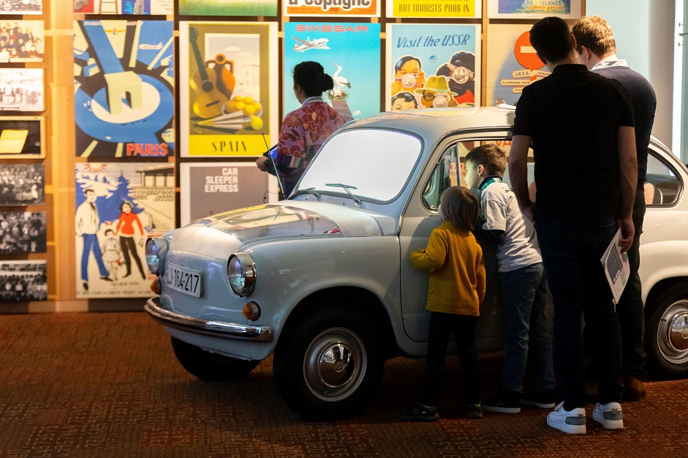 Family in Zastava car in museum