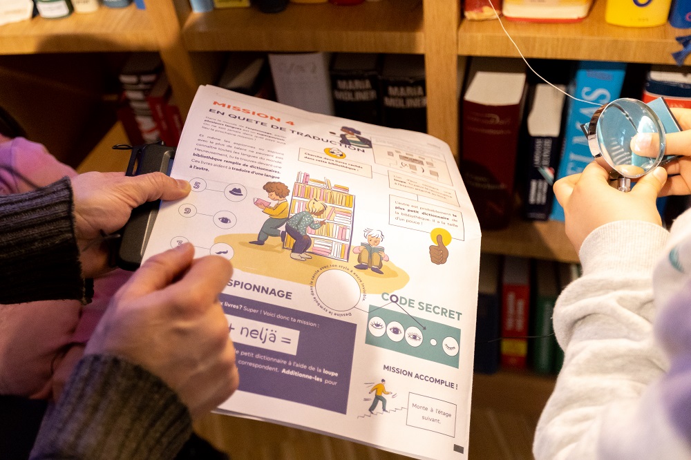 Museum newspaper in front of bookcase