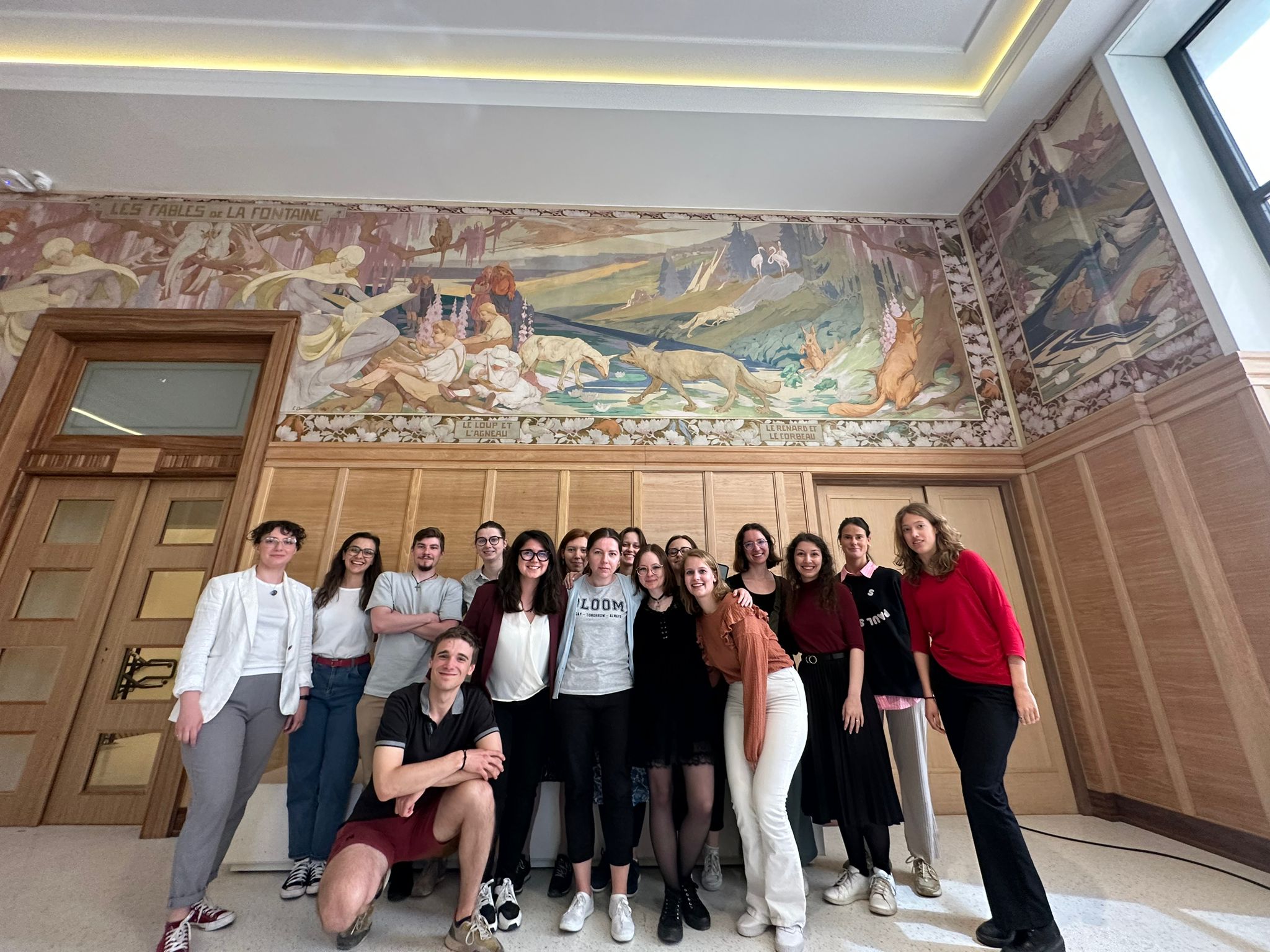 Group photo of students in Fables Room