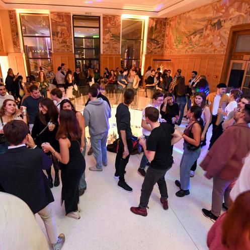 People dancing in Fables Room of museum