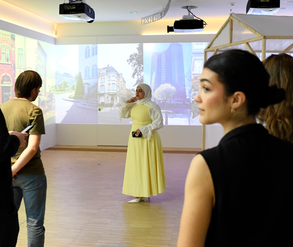 Woman giving speech in exhibition area