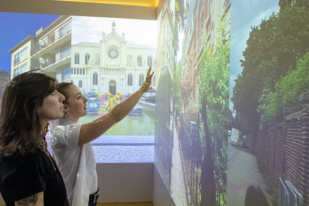 Two women discussing projection