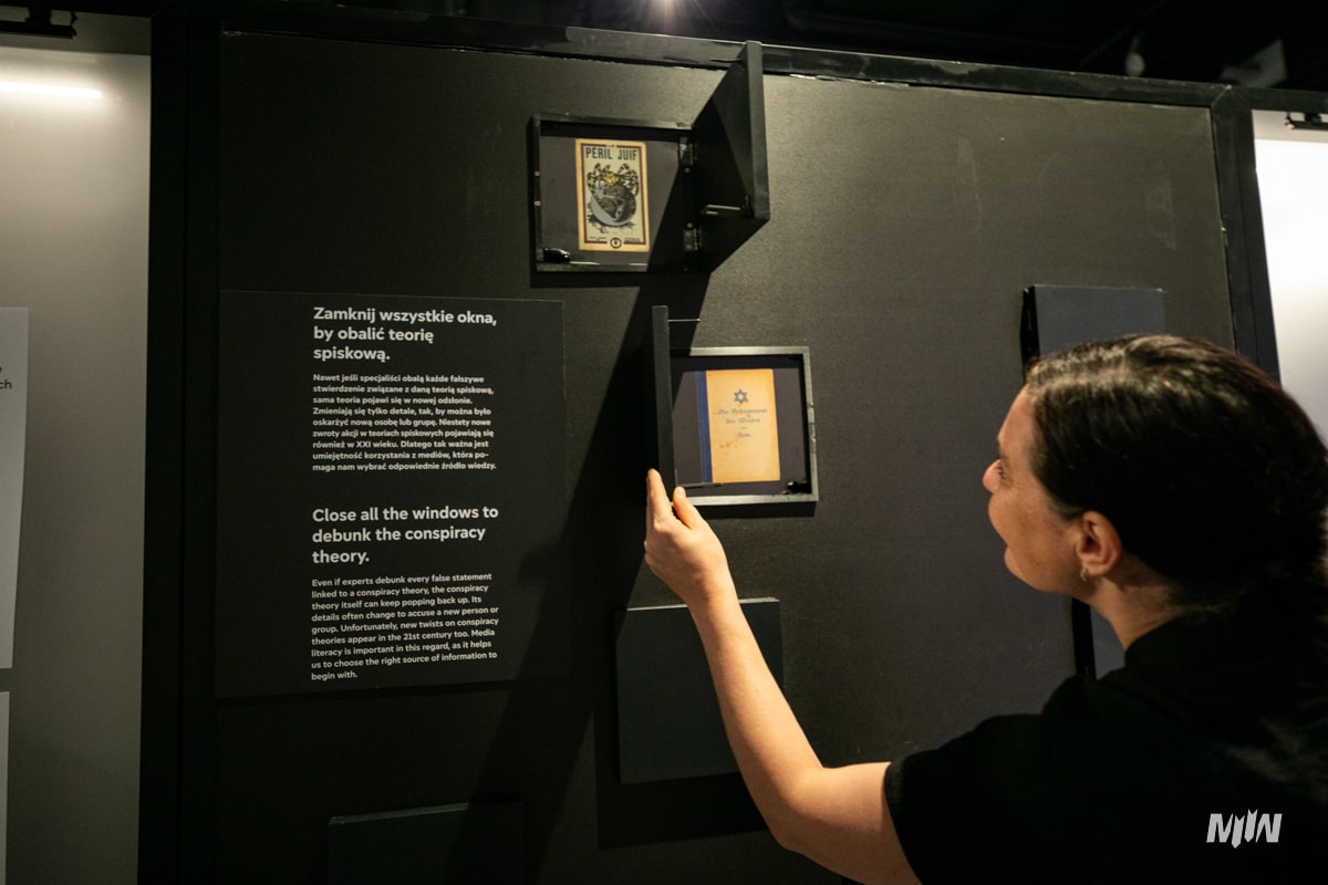 Woman opening display case