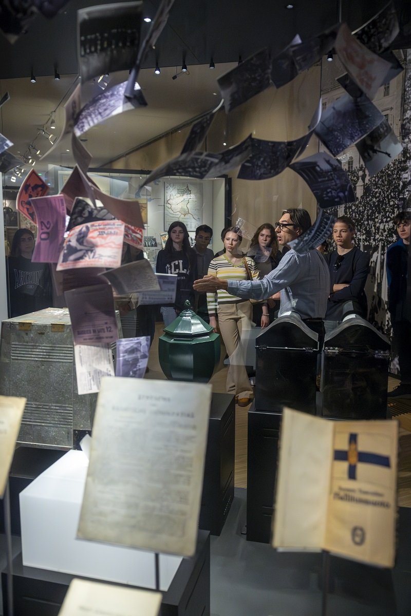 Young students on guided tour in democracy section of museum