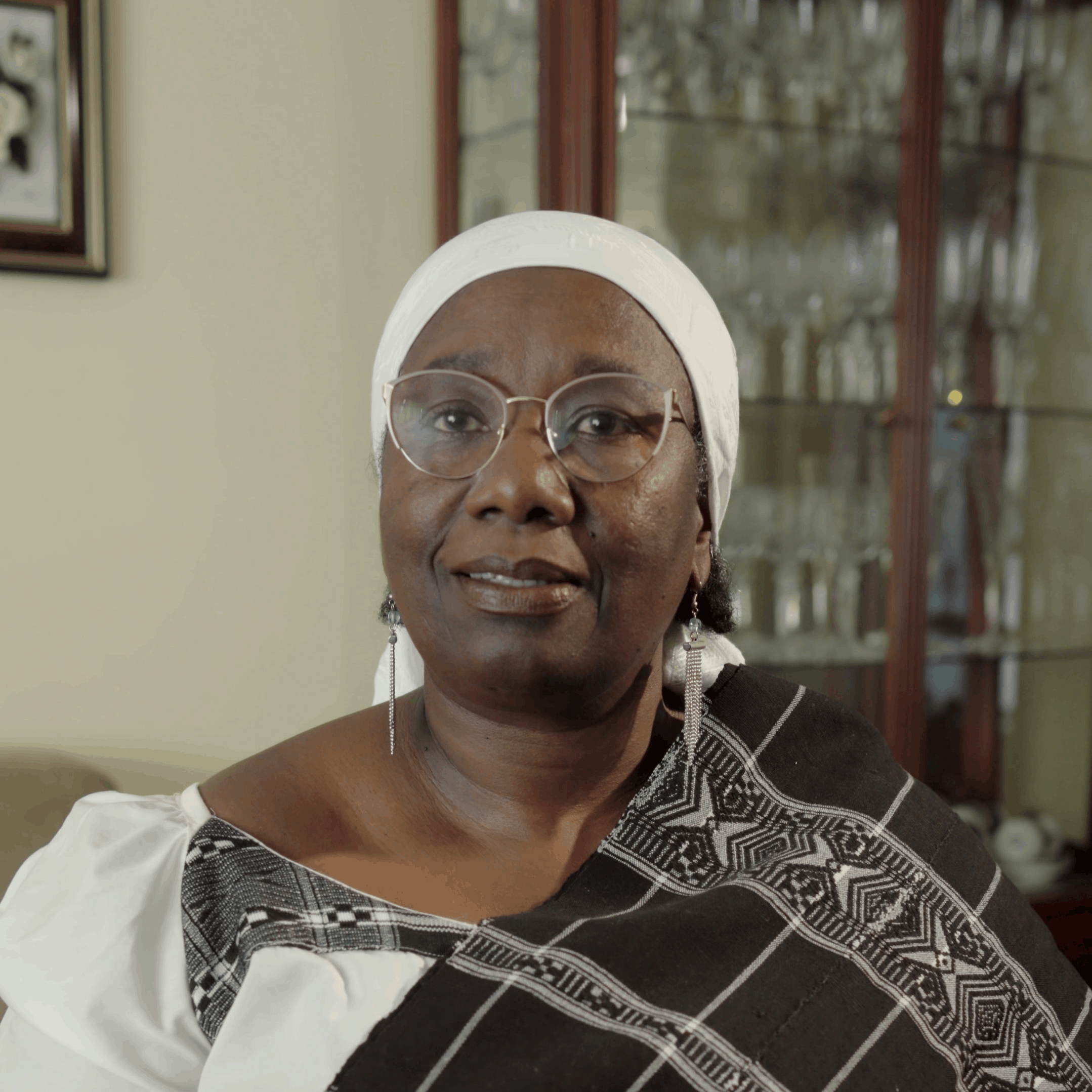Woman with white head-scarf