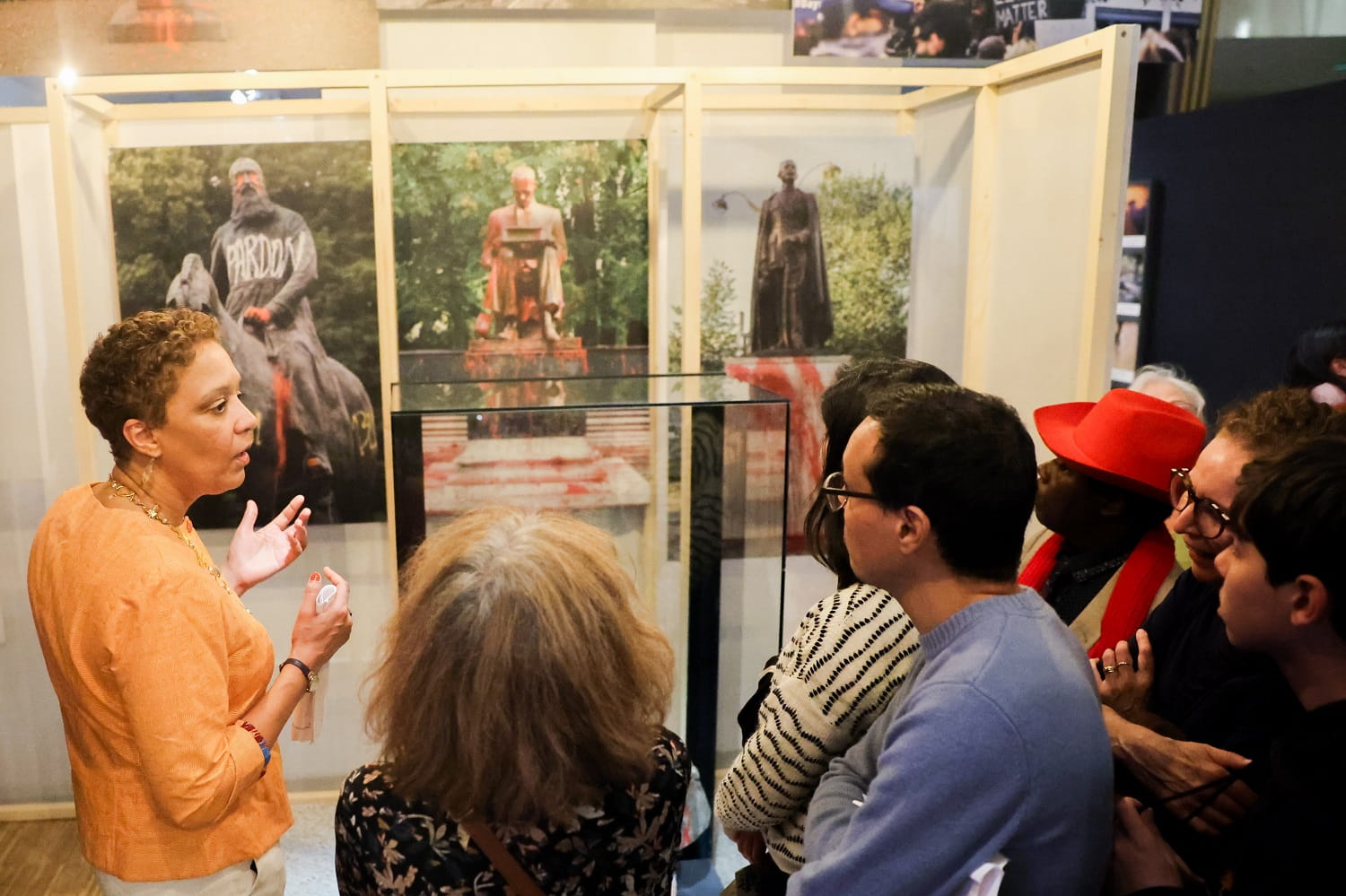 Woman giving tour in museum