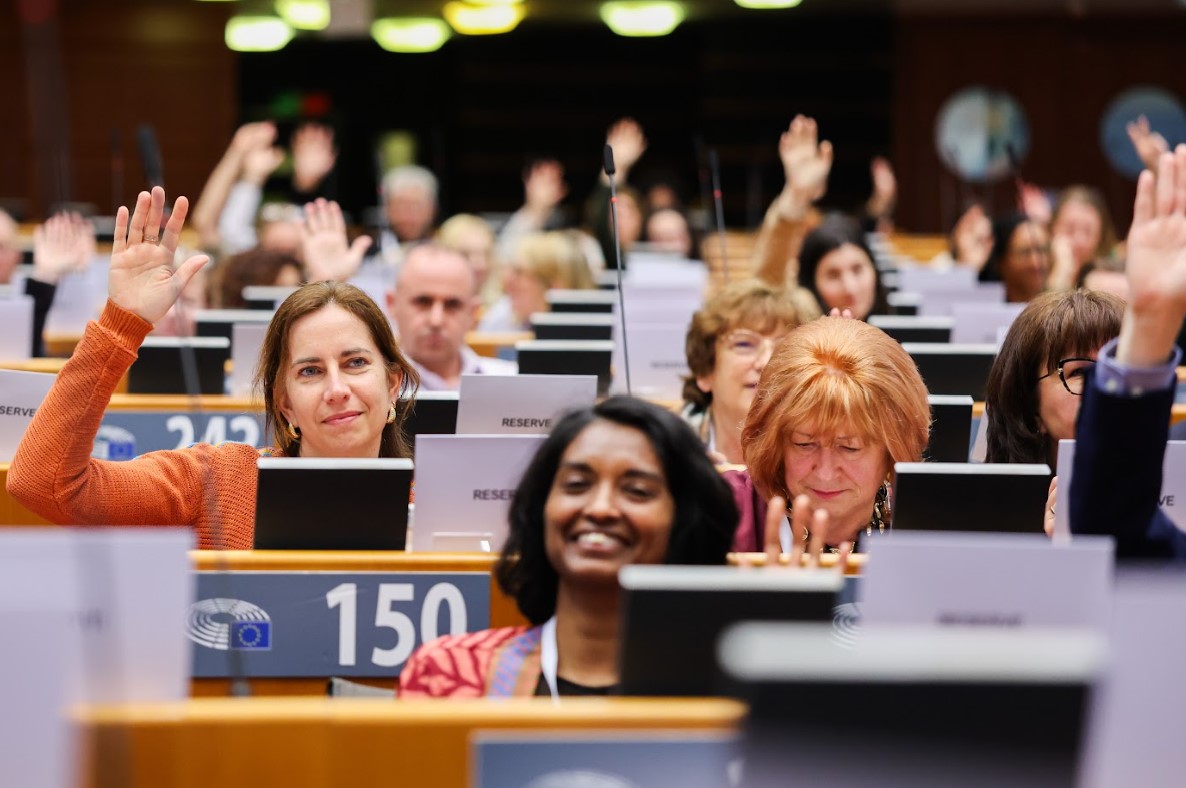 People listening to Jon Alexander presentation