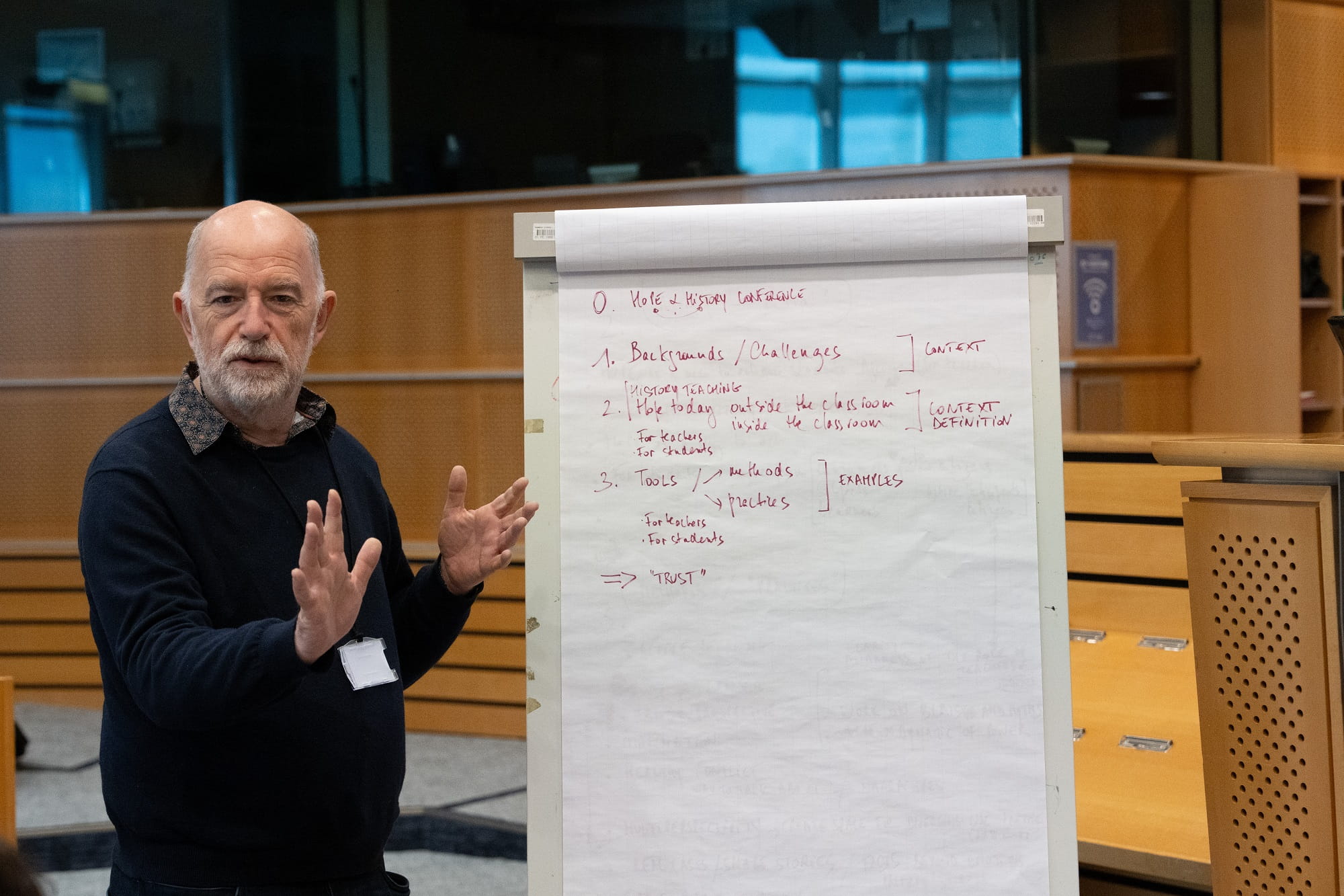 Man at a whiteboard taking notes