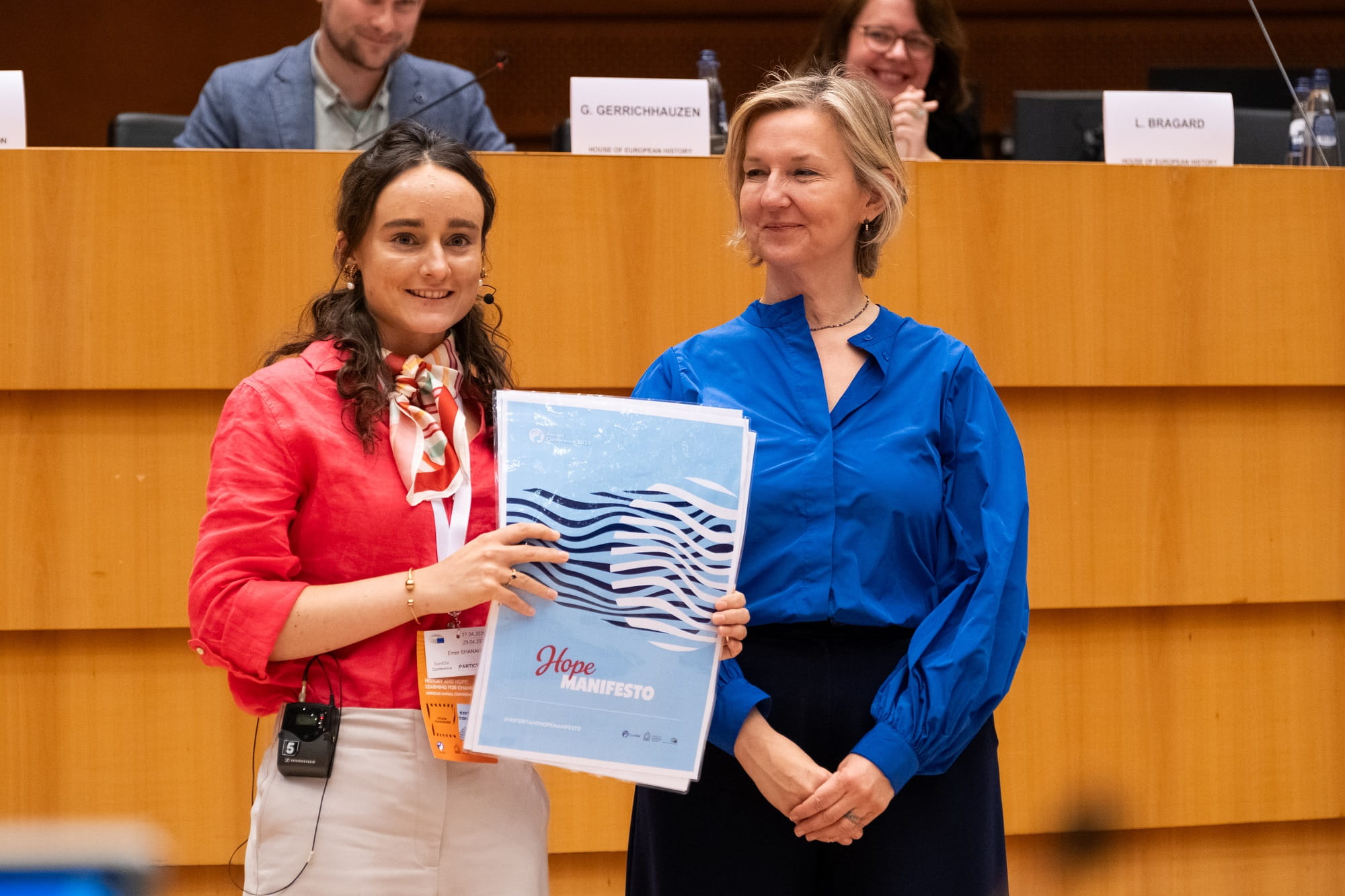 Woman presenting document