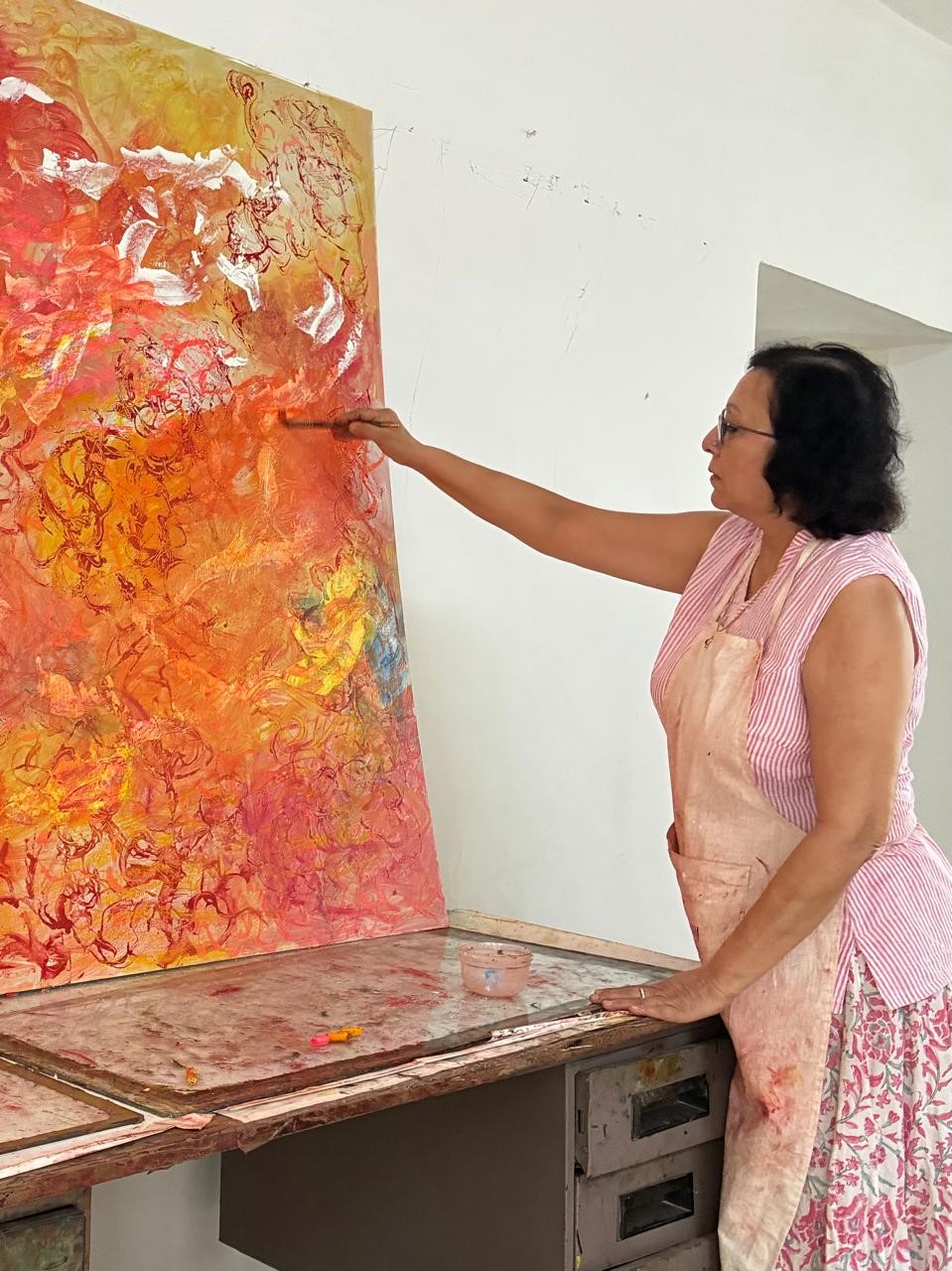 Indian woman painting