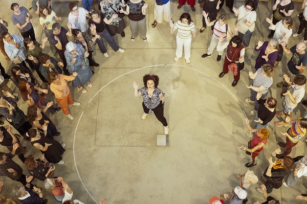 Person in crowd dancing
