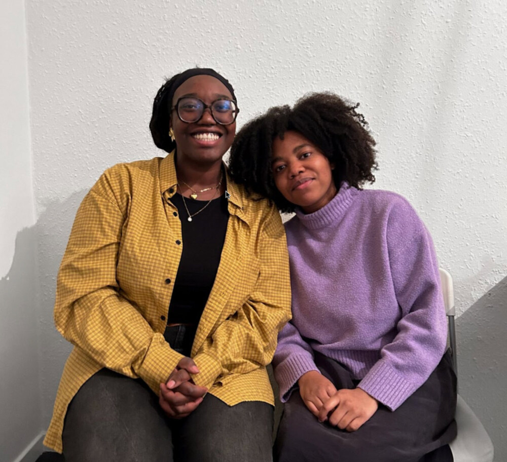 Two women sitting together