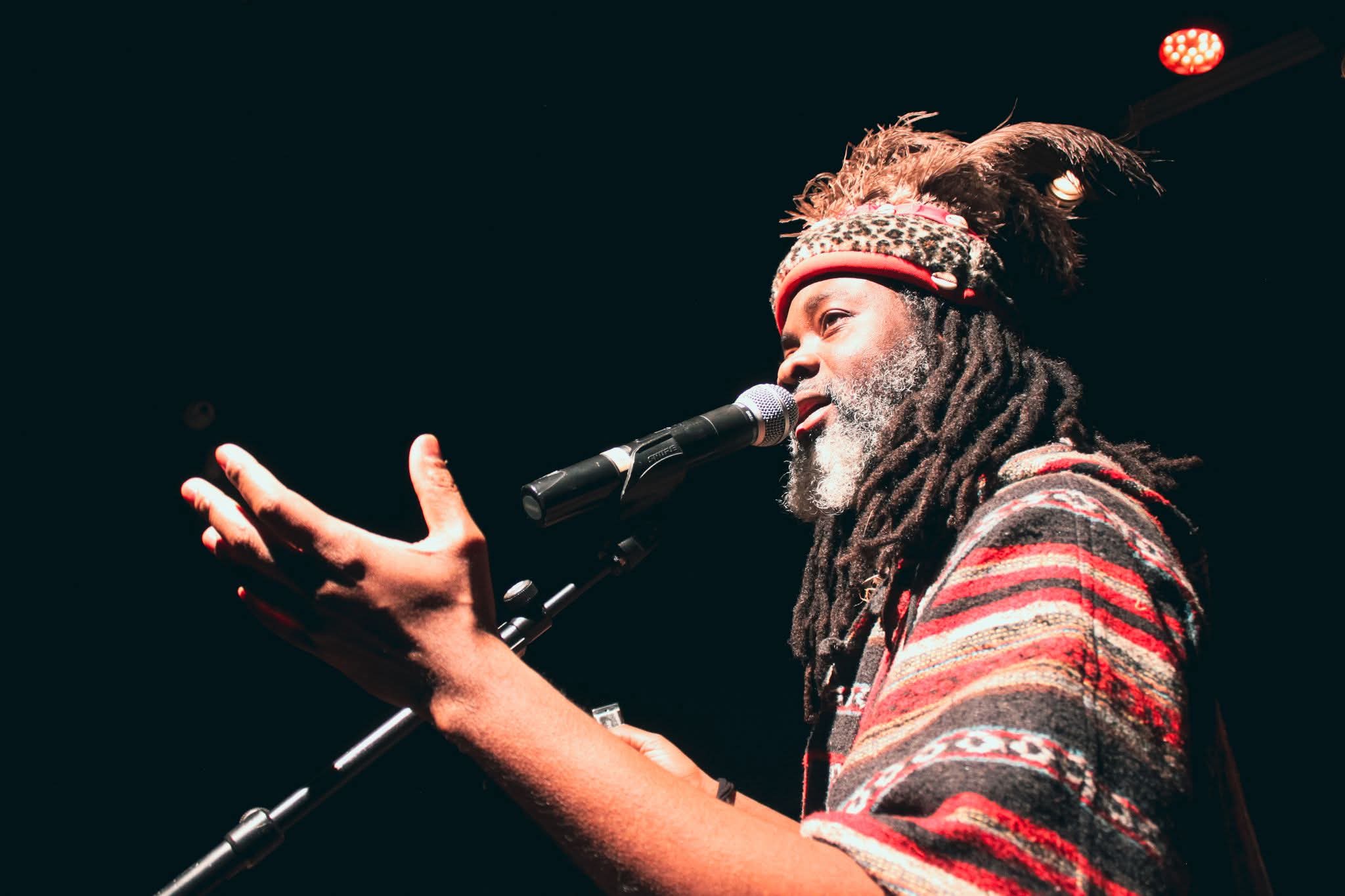 Man in African clothes singing
