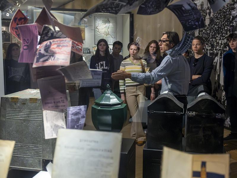 Young students on guided tour in democracy section of museum