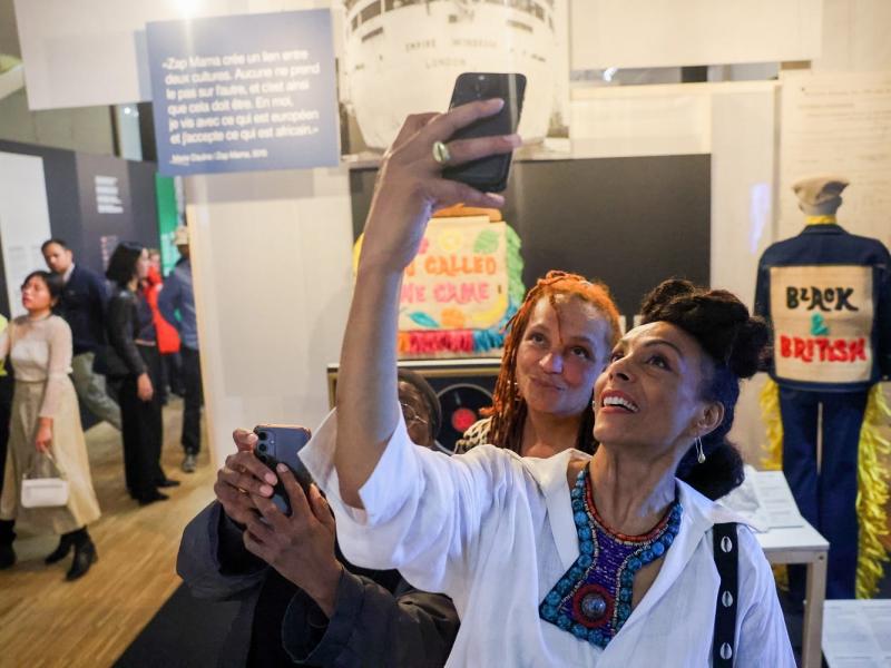 Two women doing selfie in museum