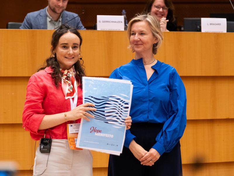 Woman presenting document