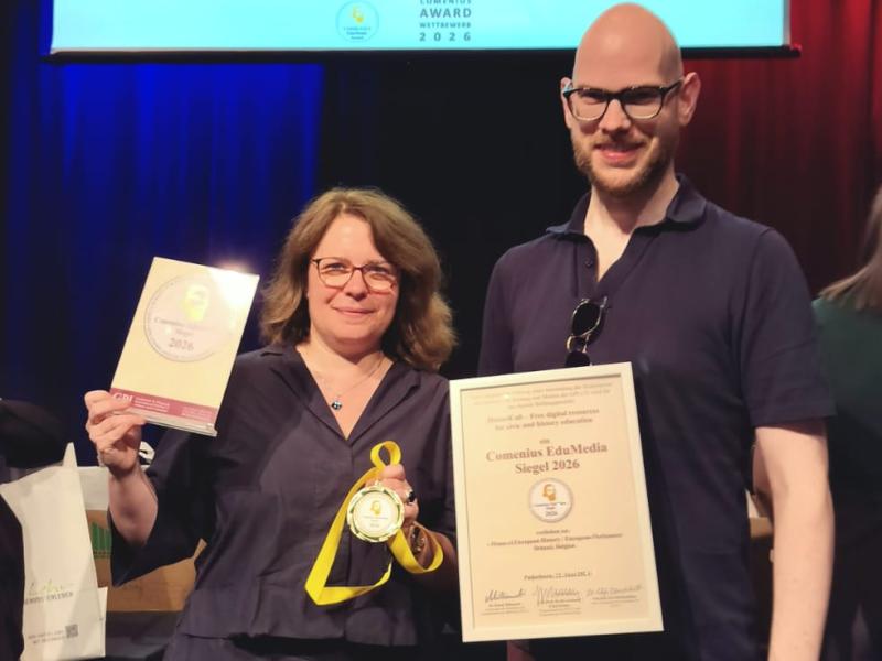 Woman and man with certificate