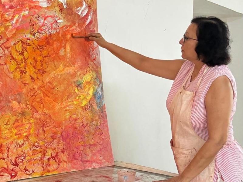 Indian woman painting