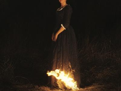 woman in front of fire