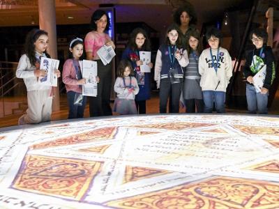 Childrens group in front of projected image