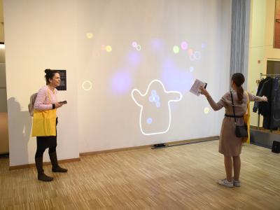 People using interactive bubbles game