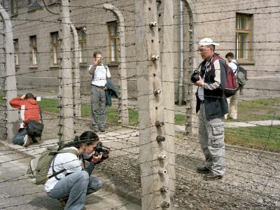 Photographing barbed wire at the Auschwitz-Birkenau Memorial and Museum