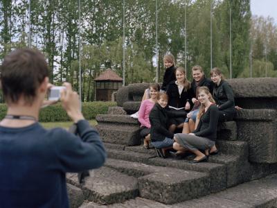 Group posing at former concentration camp