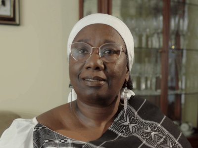 Woman with white head-scarf