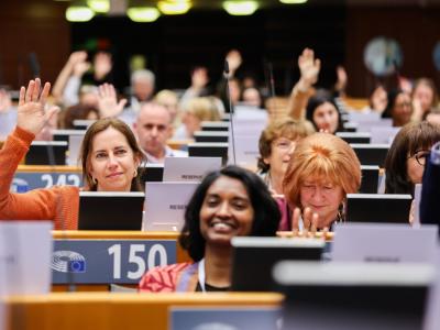 People listening to Jon Alexander presentation