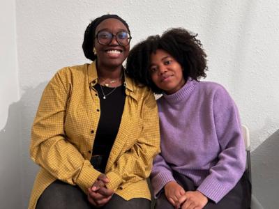 Two women sitting together