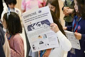Girl reading spy trail newspaper
