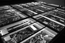 Glass floor with discarded electrical items