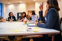 People around table brainstorming