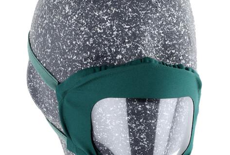Mask with see-through plastic on mouth