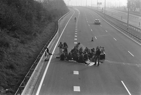 Black white photo young people party motorway