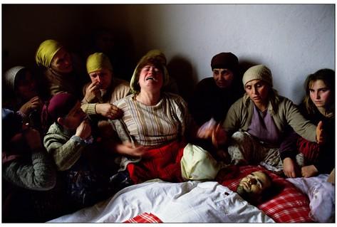 Woman crying Kosovo funeral