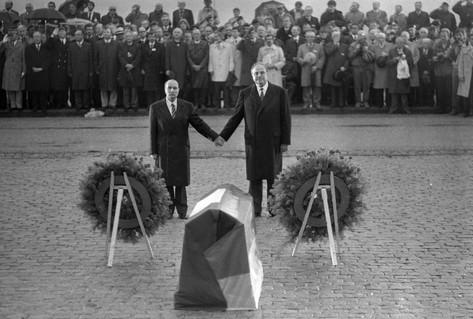 Black white photograph leaders holding hands