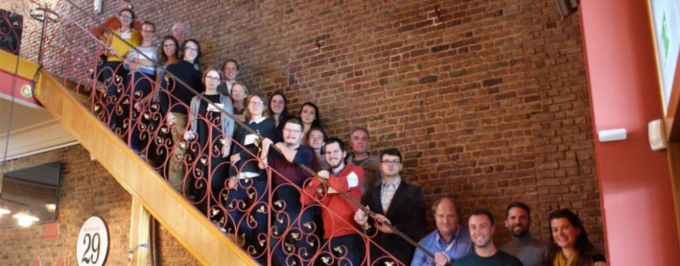 Representatives from museums on staircase for Rubbish project