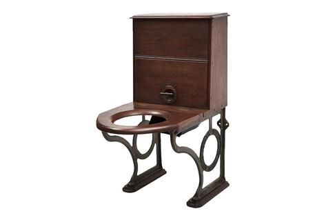 Brown wooden old fashioned toilet