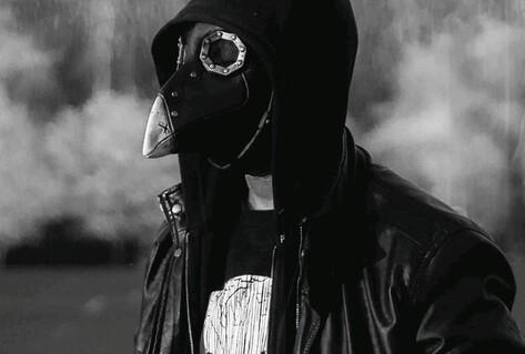 Black and white photo of bird mask