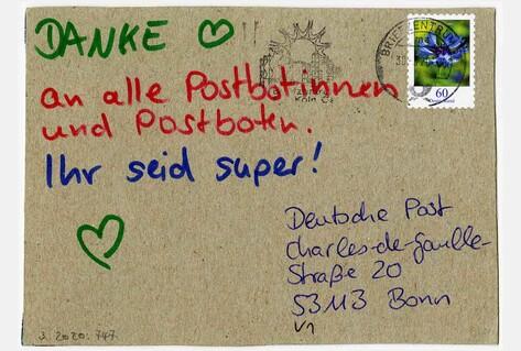 Envelope with thankyou message written in coloured pen