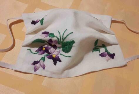 White mask with flower 