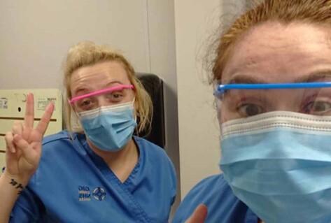 Picture of Tara McCarron from County Monaghan and a colleague working on a Covid 19 ward