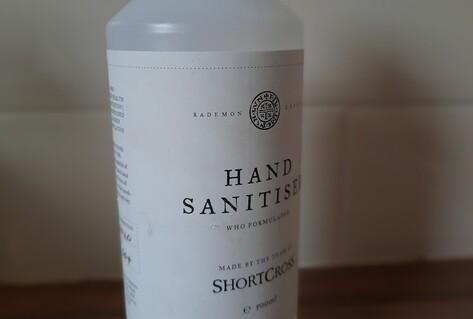 bottle hand santiser on table